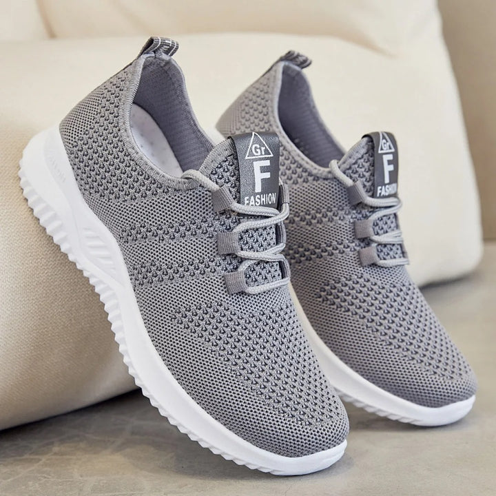 Grey mesh sports shoes for women