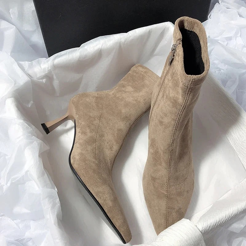 Khaki ankle boots with a stiletto heel and a zipper