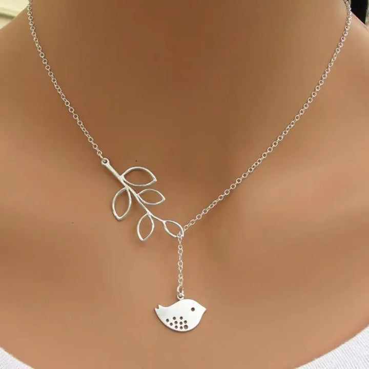 Silver Necklace with Branch and Bird Subtle Elegance of Nature