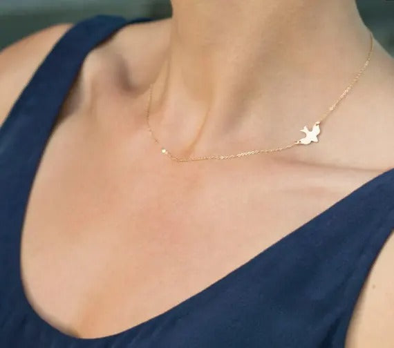 Gold Minimalist Bird Necklace Symbol of Freedom