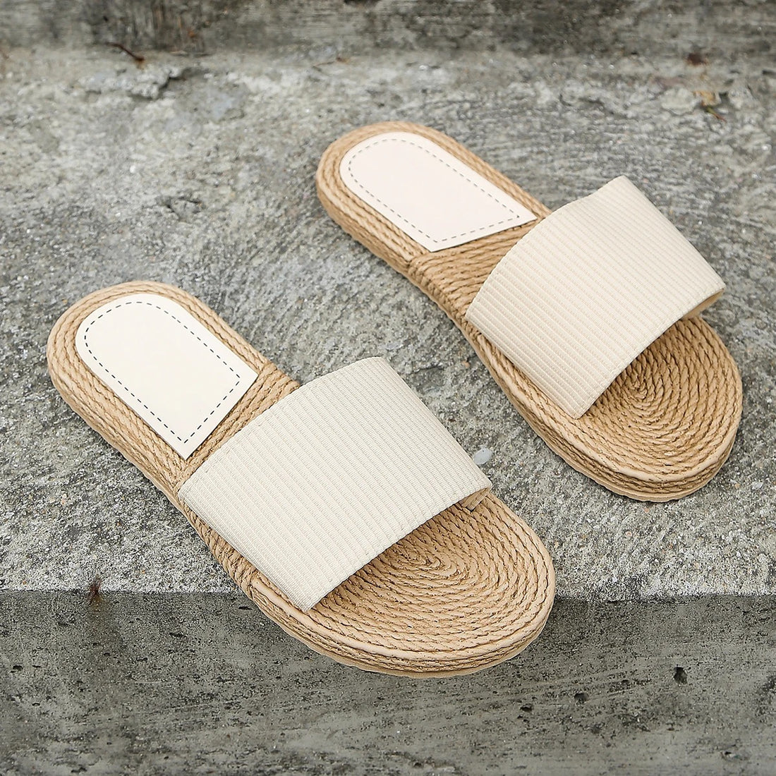 Beige flip-flops with a soft sole and a flat heel