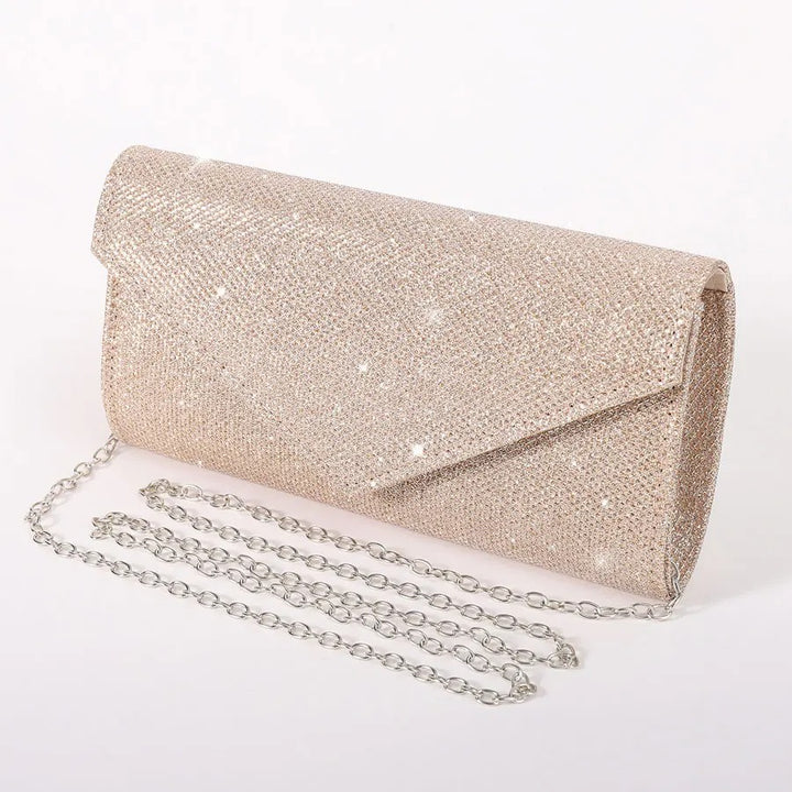 Evening clutch bag in shiny champagne with chain